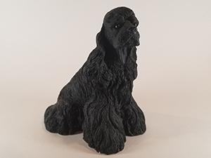 Using the DIY photo booth backdrop setup, I took a sample photo of a Cocker Spaniel statue.