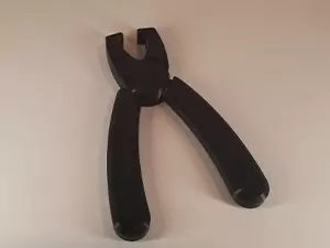 The fourth entry in the 3D printed tools list is JST Pliers 3D printed tool. Shown in the photo is the pliers, assembled, to assist with safely removing JST connectors.